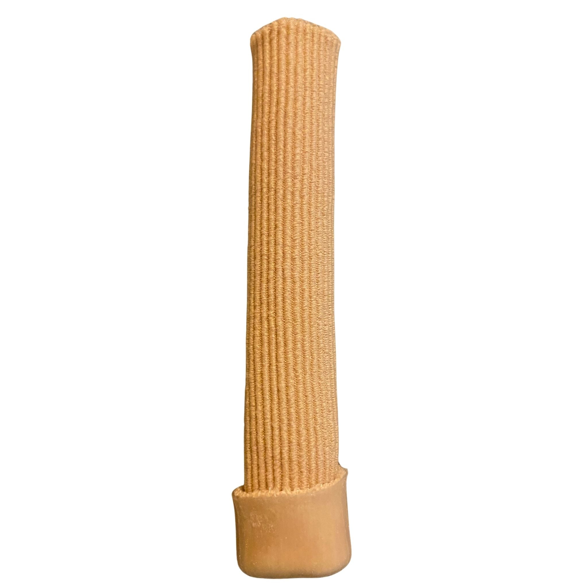 Beige textured gel toe sleeve on a white background