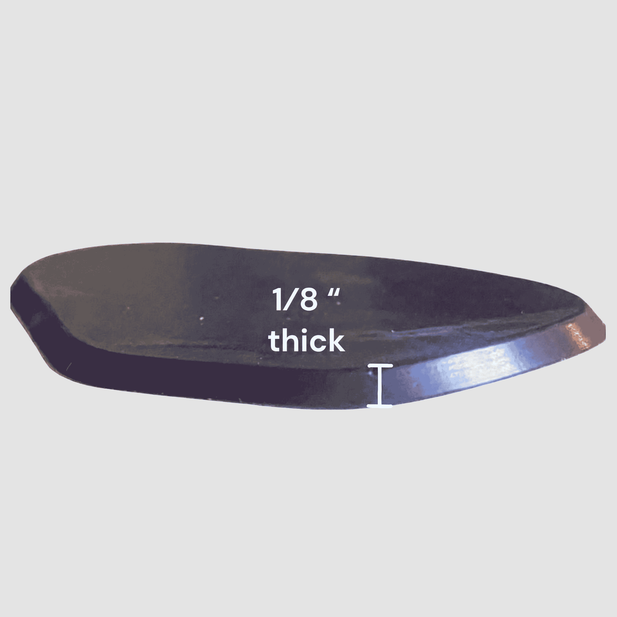 A purple reusable gel metatarsal pad on a light gray background with white text reading '1/8" thick' and a small measurement marker.